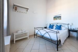 Posteľ alebo postele v izbe v ubytovaní Porcellana Apartment