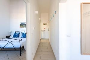 Posteľ alebo postele v izbe v ubytovaní Porcellana Apartment