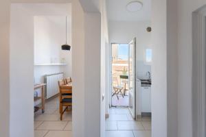 Kuchyňa alebo kuchynka v ubytovaní Porcellana Apartment