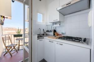 Kuchyňa alebo kuchynka v ubytovaní Porcellana Apartment
