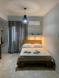 Postel nebo postele na pokoji v ubytování hommie apartment