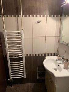 Koupelna v ubytování hommie apartment + 16 fotografií