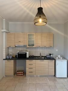 Kuchyň nebo kuchyňský kout v ubytování hommie apartment