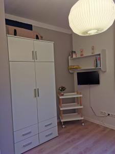 TV a/nebo společenská místnost v ubytování Merikoti