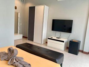TV a/nebo společenská místnost v ubytování Barbé La Maison