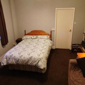 Postel nebo postele na pokoji v ubytování Puffin Holiday Apartments