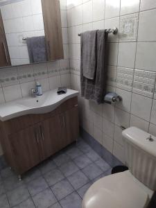 Koupelna v ubytování Kisiris House