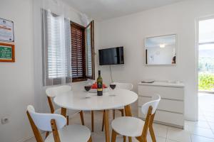TV a/nebo společenská místnost v ubytování Apartments Iskra