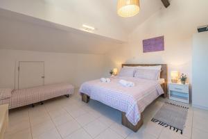 Postel nebo postele na pokoji v ubytování Apartments Iskra