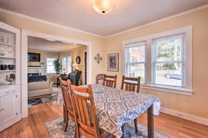 a dining room with a table and chairs at Central Eugene House with Updated Interior and Yard! in Eugene