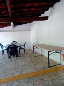 Imagem da galeria de B&B Quarto Violeta com Chaminé em Ramalhal