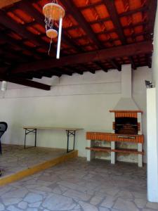 Imagem da galeria de B&B Quarto Violeta com Chaminé em Ramalhal