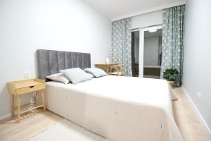 Posteľ alebo postele v izbe v ubytovaní Hygge Malta - NOWY apartament