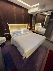 Postel nebo postele na pokoji v ubytování Havuz Manzaralı Lüx Otel Dairesi