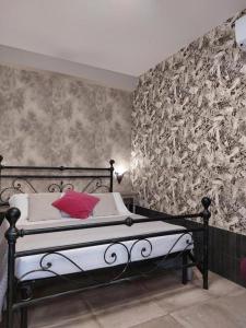 Giường trong phòng chung tại Sweet Home & Wellness Luxury Apartment