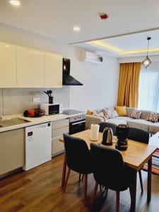 Kuchyň nebo kuchyňský kout v ubytování Otto Residences City Center 216