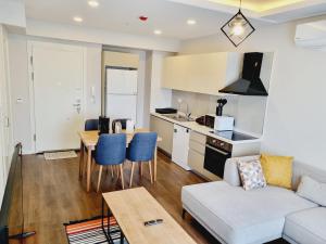 Kuchyň nebo kuchyňský kout v ubytování Otto Residences City Center 216