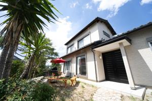 a house with a picnic table in front of it at Yokkaichi - House - Vacation STAY 68949v in Yokkaichi