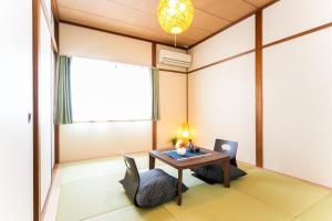 a dining room with a table and two chairs at Takashima - House - Vacation STAY 68992v in Takashima