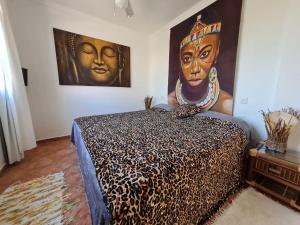 A bed or beds in a room at CASA SOL by Maria Még 6 kép