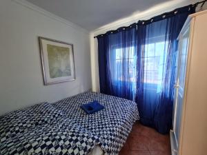 A bed or beds in a room at CASA SOL by Maria