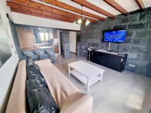 TV a/nebo společenská místnost v ubytování Apartamento Playa Jablillo