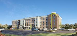 a rendering of a hotel with cars parked in a parking lot at Home2 Suites By Hilton Allentown Bethlehem Airport in Bethlehem