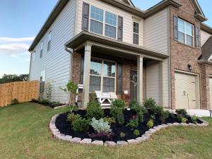 a house with a garden in the front yard at Charming 5 Bedroom spacious Home (sleeps 12-14) in Piedmont