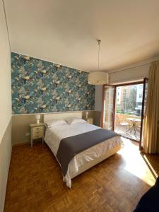 Postel nebo postele na pokoji v ubytování Lemon Rooms Sorrento