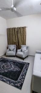 Postel nebo postele na pokoji v ubytování بيت الراحة Rest House
