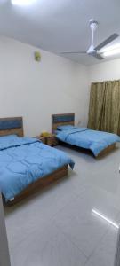 Postel nebo postele na pokoji v ubytování بيت الراحة Rest House