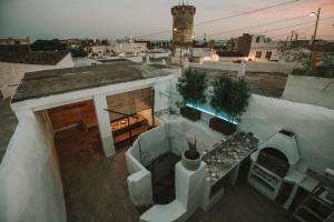 an aerial view of a building with a balcony at PRECIOSA CASA-CUEVA CON JACUZZI in Paterna