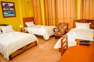Hotel Ventura Isabel客房内的一张或多张床位