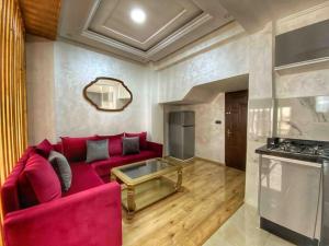 A kitchen or kitchenette at Velasquez Appart Hotel 1