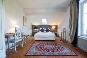Tempat tidur dalam kamar di Villa Hortebise