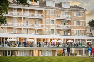 a large building with people standing outside of it at The Nici in Bournemouth