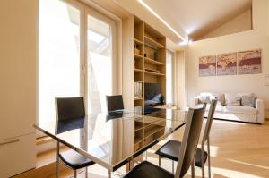 A seating area at Rizzoli Terrace Apartment