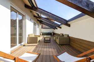 A seating area at Rizzoli Terrace Apartment