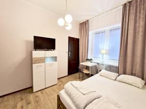 Postel nebo postele na pokoji v ubytování Hostel Helvetia Rooms Warsaw CITY CENTER and OLD TOWN