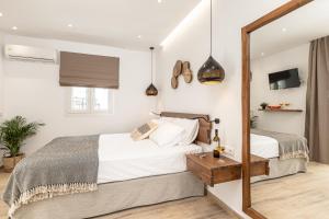 Galazia Boutique Apartments客房内的一张或多张床位