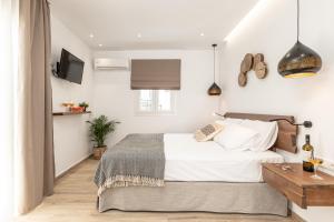 Galazia Boutique Apartments客房内的一张或多张床位