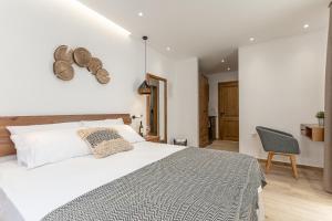 Galazia Boutique Apartments客房内的一张或多张床位