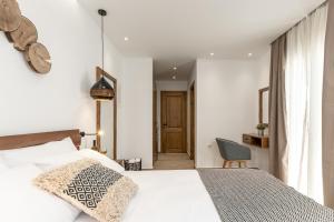 Galazia Boutique Apartments客房内的一张或多张床位