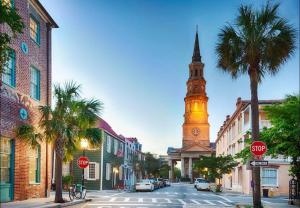 a city street with a clock tower in the distance at Quiet & Comfy Townhouse - Close to Charleston in Charleston