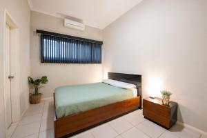 Postel nebo postele na pokoji v ubytování 19 Corella Court + 9 fotografií