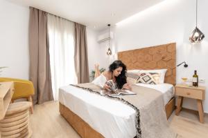Galazia Boutique Apartments客房内的一张或多张床位
