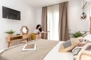Galazia Boutique Apartments客房内的一张或多张床位