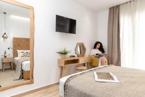Galazia Boutique Apartments客房内的一张或多张床位
