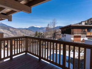 a balcony with a view of the mountains at Appartement Valmorel, 3 pièces, 6 personnes - FR-1-291-890 in Valmorel