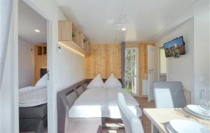 Postel nebo postele na pokoji v ubytování Tiny Haus 35 Am Brombachsee